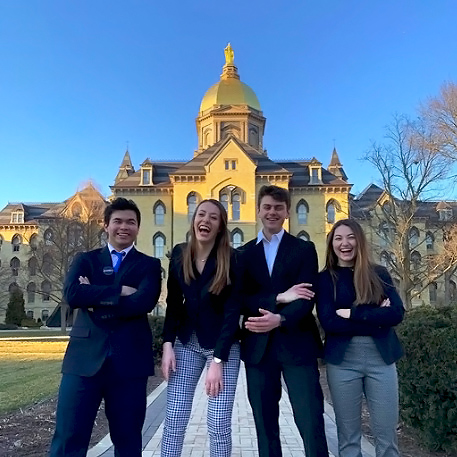 Student group with the Golden Dome in the background.