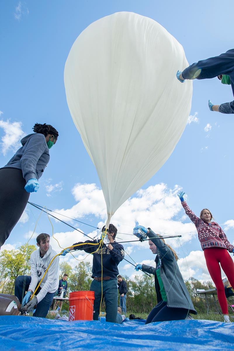 IrishSat Team members filling balloon with helium